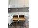 Kitchen cabinets with pull out shelving, offering convenient storage solutions at 7120 Wayfarer Dr # 0079, Charlotte, NC 28269