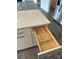 Kitchen island with drawer organizer to help keep kitchenware organized and tidy at 7120 Wayfarer Dr # 0079, Charlotte, NC 28269