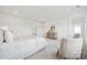 Serene main bedroom with recessed lighting, plush bedding, and a stylish accent console at 7120 Wayfarer Dr # 0079, Charlotte, NC 28269