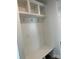Hallway with built-in bench, storage, and hooks in a well lit room at 7120 Wayfarer Dr # 0079, Charlotte, NC 28269