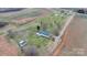Sprawling property featuring a single Gathering home, shed, and large yard at 760 Tomlin Mill Rd, Statesville, NC 28625