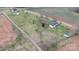 Areal view of a well-maintained farm and house at 760 Tomlin Mill Rd, Statesville, NC 28625