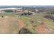 Aerial shot of a home in a rural area surrounded by open fields at 760 Tomlin Mill Rd, Statesville, NC 28625