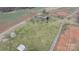 Areal view of a well-maintained farm and house at 760 Tomlin Mill Rd, Statesville, NC 28625