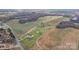 Aerial shot of multiple homes in a rural area next to a roadway at 760 Tomlin Mill Rd, Statesville, NC 28625