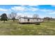 Well-maintained home featuring a large deck and sprawling backyard at 760 Tomlin Mill Rd, Statesville, NC 28625