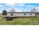 Well-maintained home featuring a large deck and sprawling backyard at 760 Tomlin Mill Rd, Statesville, NC 28625