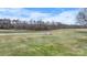 Large fenced backyard with a utility box at 760 Tomlin Mill Rd, Statesville, NC 28625