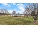 A charming home with a well-manicured lawn and scattered trees, captured from an aerial perspective at 760 Tomlin Mill Rd, Statesville, NC 28625