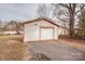 Single car detached garage with a paved driveway at 94 Sumner Nw Ave, Concord, NC 28027