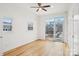 Airy bedroom with great natural light, hardwood floors, and access to balcony at 971 Westmere Ave, Charlotte, NC 28208