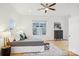 Spacious primary bedroom showcasing a ceiling fan and hardwood floors at 971 Westmere Ave, Charlotte, NC 28208