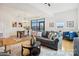 Spacious living room with open floor plan, hardwood floors, and modern furnishings at 971 Westmere Ave, Charlotte, NC 28208