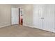 Bedroom features a spacious closet and neutral tones, creating a serene and inviting atmosphere at 1027 Fountainbrook Dr, Indian Trail, NC 28079