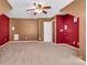 Bedroom showcasing a ceiling fan, soft carpet, and a closet for a cozy retreat at 1027 Fountainbrook Dr, Indian Trail, NC 28079