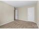 Bedroom featuring neutral walls, soft carpet, and a closet for a cozy retreat at 1027 Fountainbrook Dr, Indian Trail, NC 28079