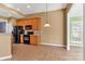 Eat-in kitchen with black appliances, tile floors, and ample cabinet space at 1027 Fountainbrook Dr, Indian Trail, NC 28079