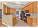 Bright kitchen with modern appliances, tile backsplash, and plenty of storage at 1027 Fountainbrook Dr, Indian Trail, NC 28079