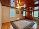 Charming bedroom with hardwood floors, wood ceiling and ceiling fan at 110 30Th Nw Ave, Hickory, NC 28601