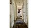 Long hallway with wood-look flooring and access to multiple rooms at 110 30Th Nw Ave, Hickory, NC 28601