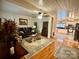 Open living room with hardwood floors and kitchen view at 110 30Th Nw Ave, Hickory, NC 28601