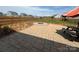 Backyard patio area with fire pit and picnic table at 1112 Culver Spring Way, Charlotte, NC 28215