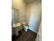 Clean bathroom with pedestal sink and toilet at 1112 Culver Spring Way, Charlotte, NC 28215