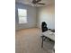 Bedroom with ceiling fan, window, and office chair at 1112 Culver Spring Way, Charlotte, NC 28215