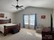 Spacious bedroom with large windows and ceiling fan at 1112 Culver Spring Way, Charlotte, NC 28215