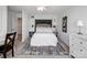 Cozy bedroom with built-in shelving and window at 11317 Trailside Nw Rd, Huntersville, NC 28078