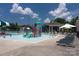 A colorful splash pad with slide and water features is a perfect place for to play at 11317 Trailside Nw Rd, Huntersville, NC 28078