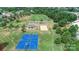 Aerial view showcases sports courts, playground and picnic shelter amidst lush green space at 11317 Trailside Nw Rd, Huntersville, NC 28078