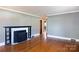 Living room with hardwood floors and fireplace at 1138 Norland Rd, Charlotte, NC 28205