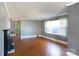 Bright living room with hardwood floors and a fireplace at 1138 Norland Rd, Charlotte, NC 28205