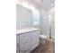 Modern bathroom with double vanity, shower, and updated fixtures at 116 Durham Rd, Stanley, NC 28164