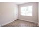 Bedroom with closet and window, hardwood floors at 116 Durham Rd, Stanley, NC 28164