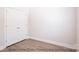 Bedroom with double doors and hardwood flooring at 116 Durham Rd, Stanley, NC 28164