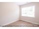 Bedroom with large window and hardwood floors at 116 Durham Rd, Stanley, NC 28164