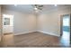 Spacious bedroom with wood floors, ensuite bathroom, and ample natural light at 116 Durham Rd, Stanley, NC 28164