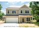 Two-story Craftsman style home with a large front yard and attached garage at 116 Durham Rd, Stanley, NC 28164