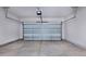 Spacious garage with a clean, concrete floor and a modern, paneled garage door with an automatic opener at 116 Durham Rd, Stanley, NC 28164