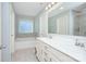 Elegant bathroom with double vanity, soaking tub, tiled backsplash and ample storage at 1244 Scotch Meadows Loop, Monroe, NC 28110