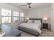 Comfortable bedroom with ample natural light and neutral decor, promoting relaxation at 12849 Robert Walker Dr, Davidson, NC 28036