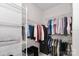 Organized walk-in closet with ample storage space and shelving for clothing and accessories at 12849 Robert Walker Dr, Davidson, NC 28036