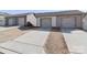 View of three garages, with a long drive way leading to the garage door at 12849 Robert Walker Dr, Davidson, NC 28036