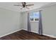 Bright bedroom with hardwood floors and neutral walls at 133 Fieldstone Farm Dr, Statesville, NC 28625