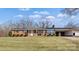 Brick ranch house with carport and landscaped lawn at 133 Fieldstone Farm Dr, Statesville, NC 28625