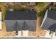 Bird's eye view of a home showcasing the roof, driveway, and surrounding landscape at 1355 Amberlight Cir, Salisbury, NC 28144