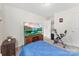 Neutral bedroom with a large television and a stationary bike at 1355 Amberlight Cir, Salisbury, NC 28144