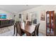 View from dining room featuring a wooden table set and view of the living room at 1355 Amberlight Cir, Salisbury, NC 28144